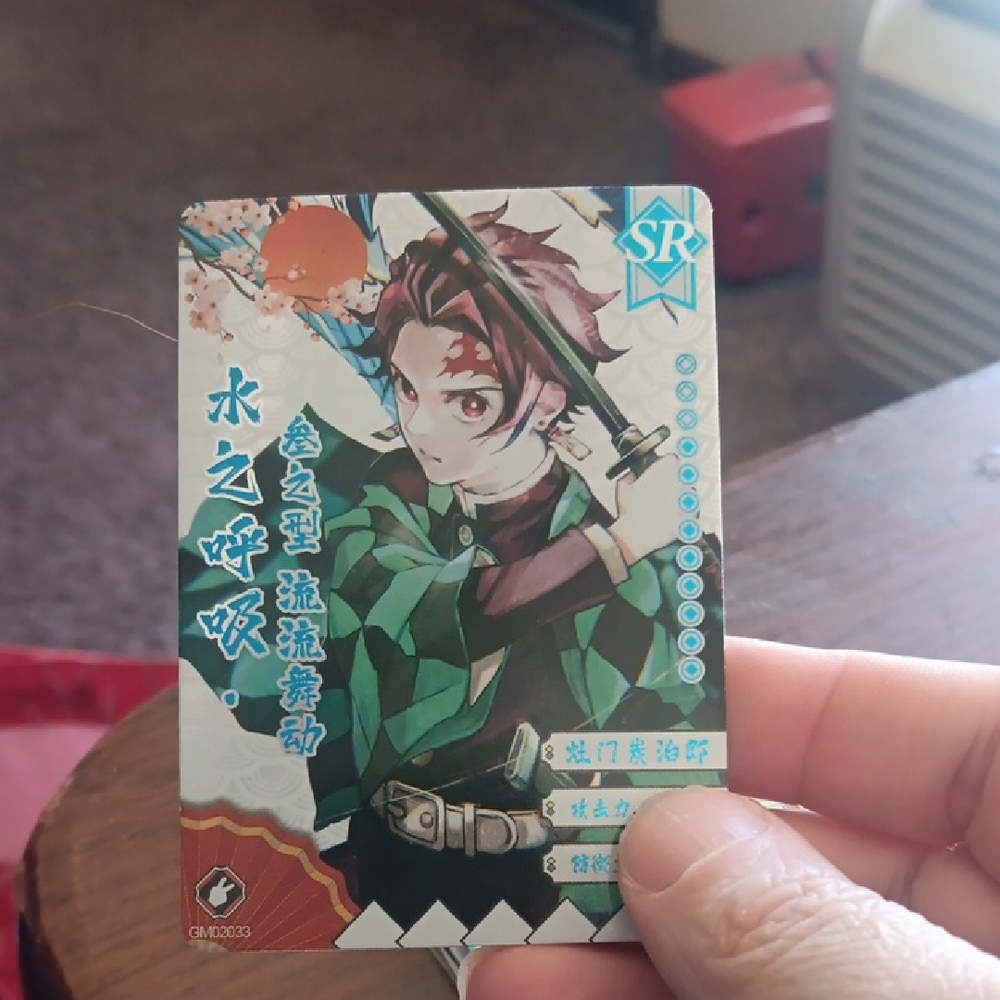 Anime Trading Card with Green and Blue Design
